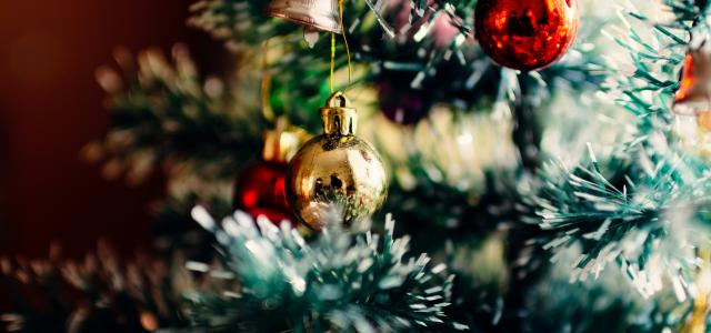 bauble balls hang on christmas tree by Rodion Kutsaiev courtesy of Unsplash.